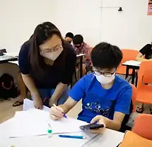 Students studying at a good tuition centre for secondary school in Singapore.